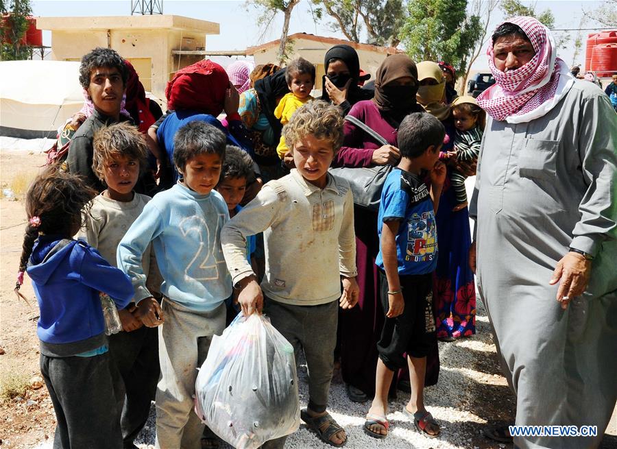 SYRIA-HOMS-REFUGEES-RETURN-RUKBAN