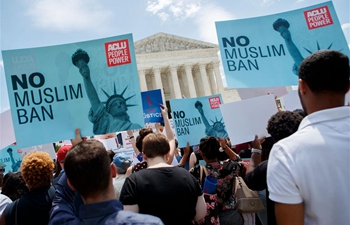 People protest against Supreme Court's ruling regarding Trump's travel ban